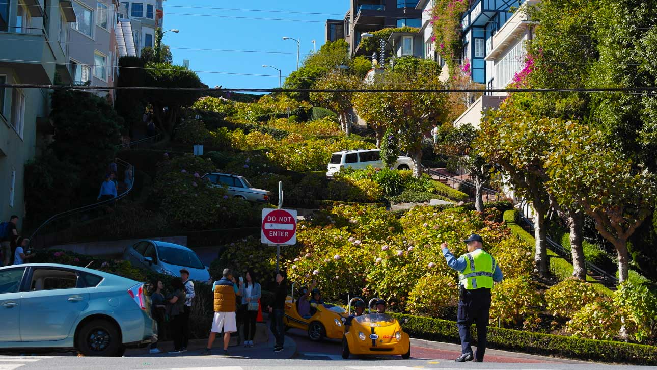 Driving Down Lombard Street: A Thrilling Tourist Attraction and Movie Icon in San Francisco Driving Down Lombard Street: A Thrilling Tourist Attraction and Movie Icon in San Francisco